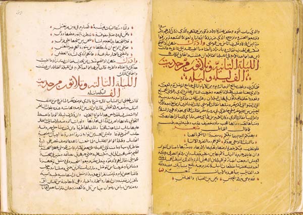 Two discolored pages of a manuscript in Arabic script