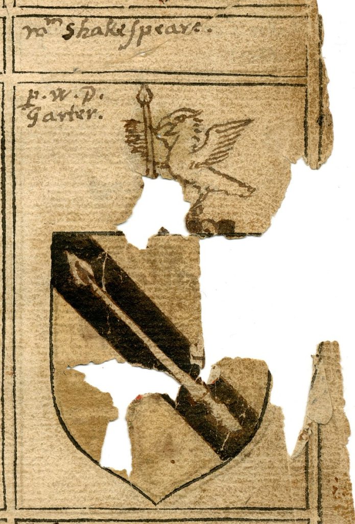 Drawing of Shakespeare's coat of arms partially missing. At the top is a bird with a spear and at the bottom is a shield with a spear in a diagonal position