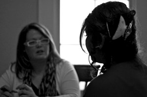 Black and white photo of anthropologist Katie Nelson conducting fieldwork among undocumented Mexican immigrant college students.