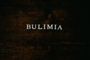 image with the word "bulimia" against dark background