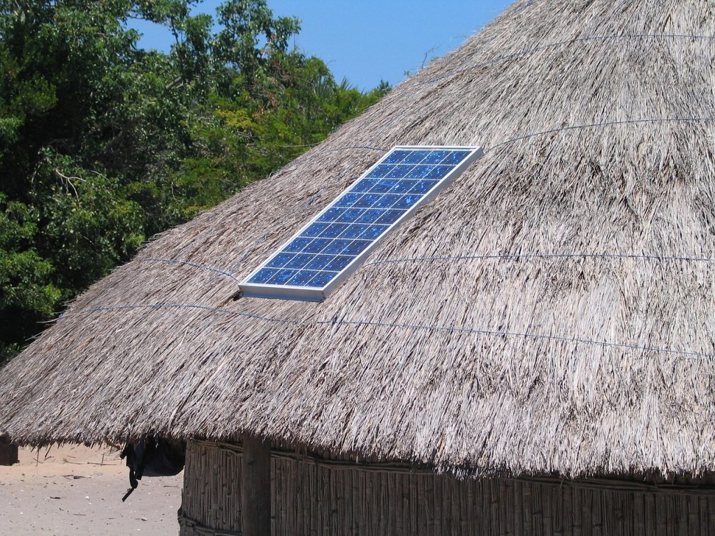 Photo of a solar panel on a hut roof.