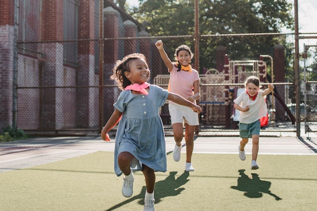 Image of three girls at play