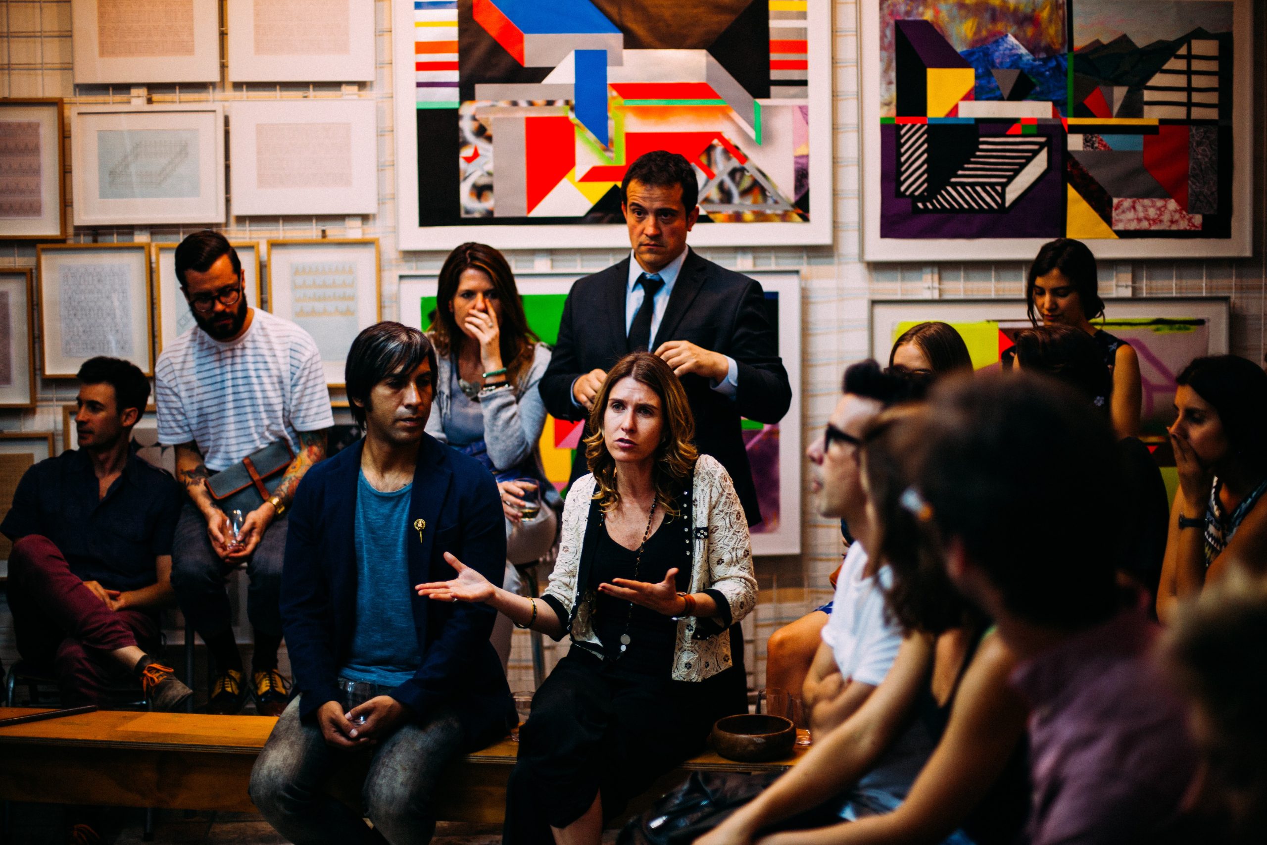 Image of a women lecturing to a group of people