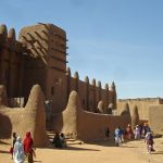 Mosque's tower and wall build from earth materials