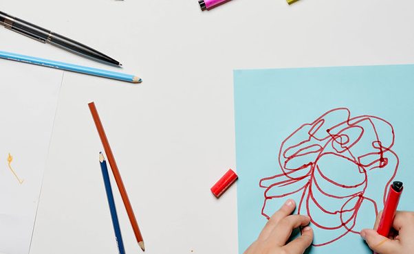 image of children drawing shapes