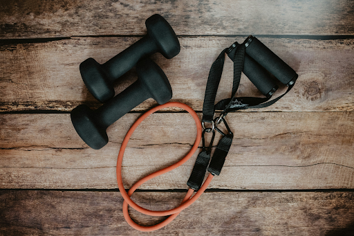 An image of dumbbells and resistance bands.